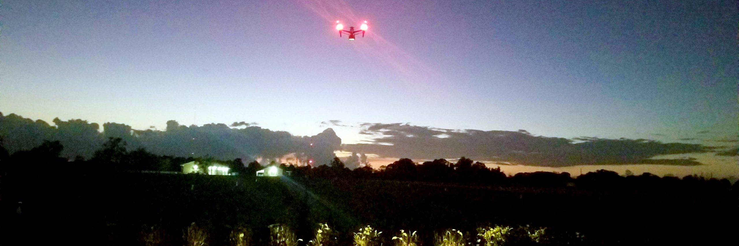 UAS-AI-drone-night-flying-over-farm-crop-field-Auburn-Alabama-USA-sm