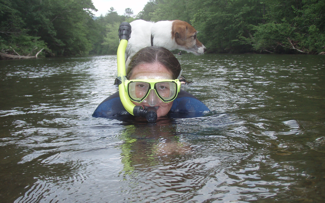 Carol Johnston snorkeling a creek