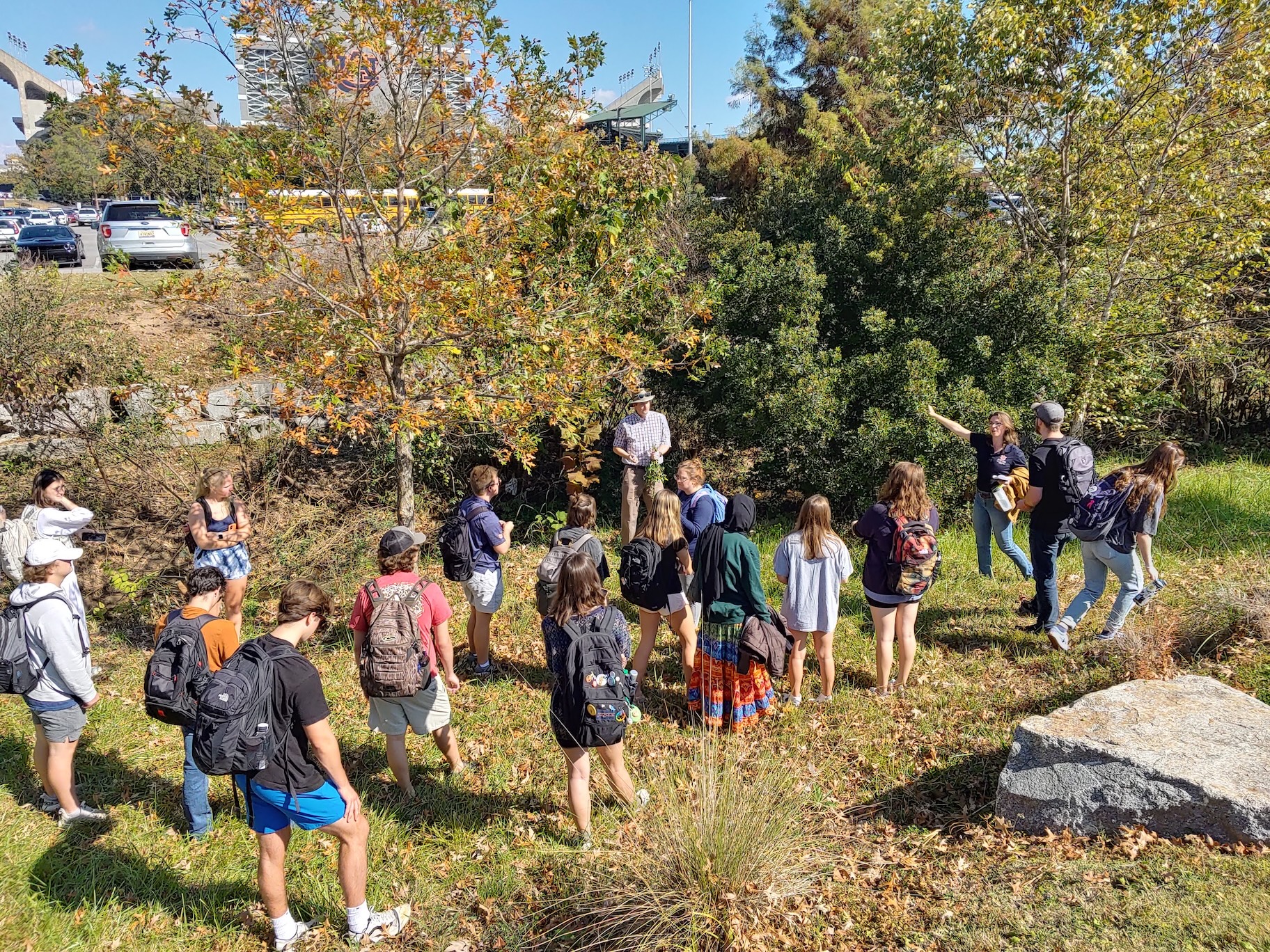 Adam teaches Auburn Students about stream restoration